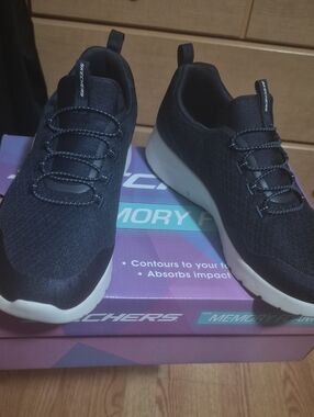 Skechers Men's Black Slip-On Knit Sneakers with White Sole